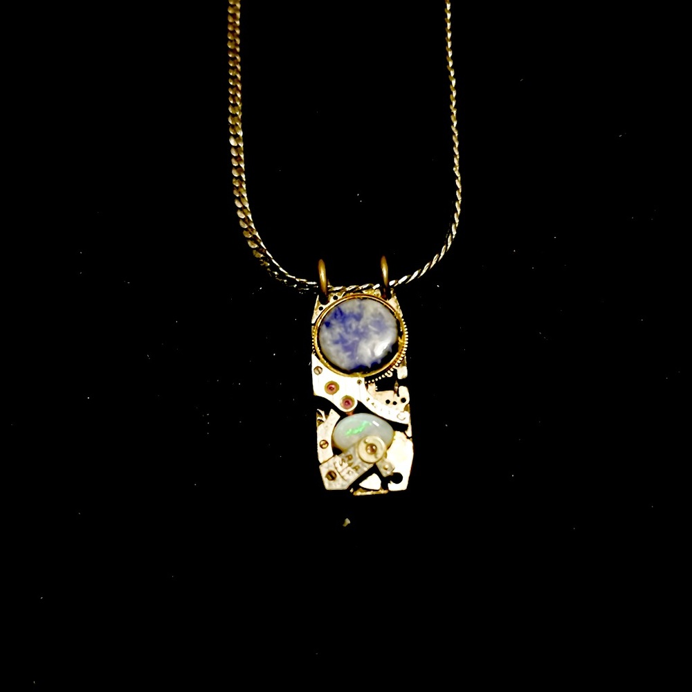 Industrial gemstone studded pendant l sodalite, opal, rubies. Holographic etched